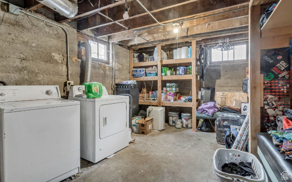 Below grade area featuring separate washer and dryer