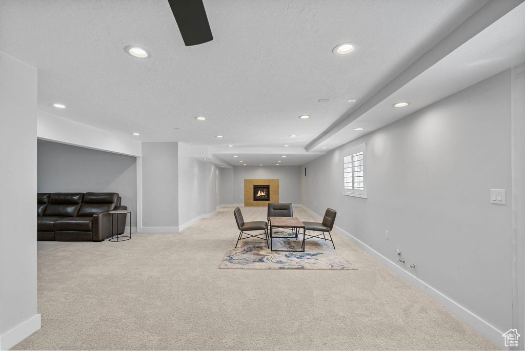 Dining space featuring baseboards, a fireplace, recessed lighting, and carpet floors