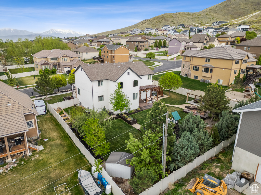 Drone / aerial view with a residential view and a mountain view