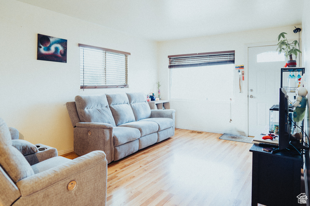 Living room with wood finished floors