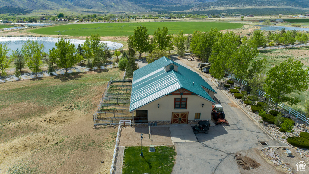 Aerial view with a rural view and a water and mountain view