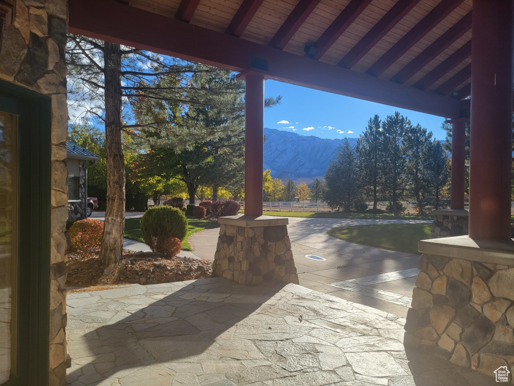 View of patio with a mountain view