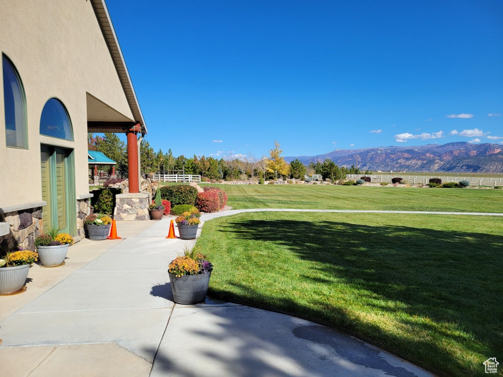 View of yard with a mountain view