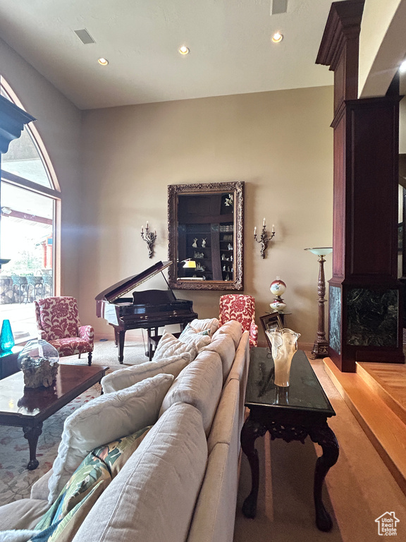 Living room featuring visible vents and recessed lighting