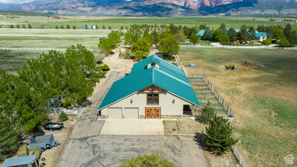 Drone / aerial view with a rural view and a mountain view