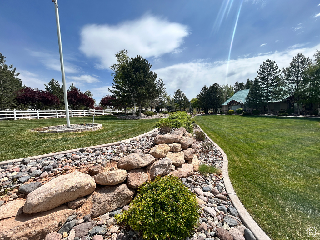View of yard with fence