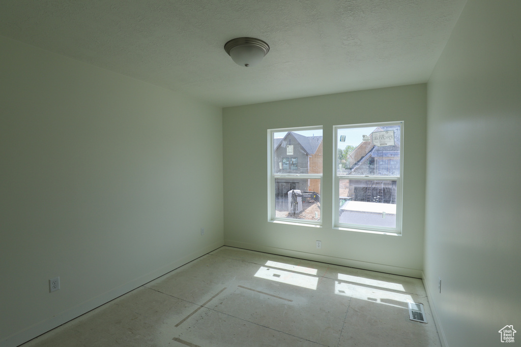 Spare room with baseboards