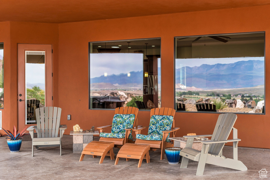 Exterior space featuring a mountain view and concrete floors