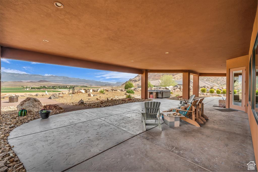 View of patio / terrace featuring a mountain view