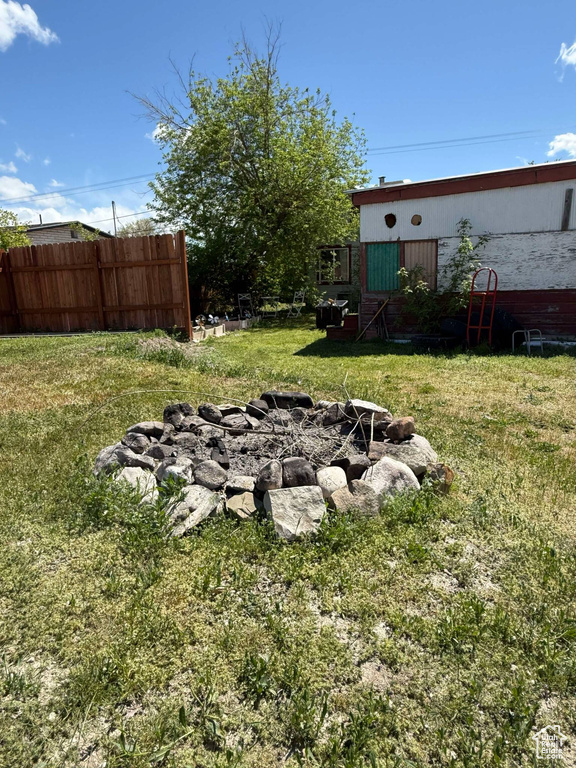 View of yard with fence