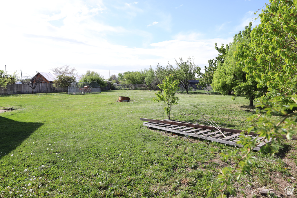 View of yard with fence
