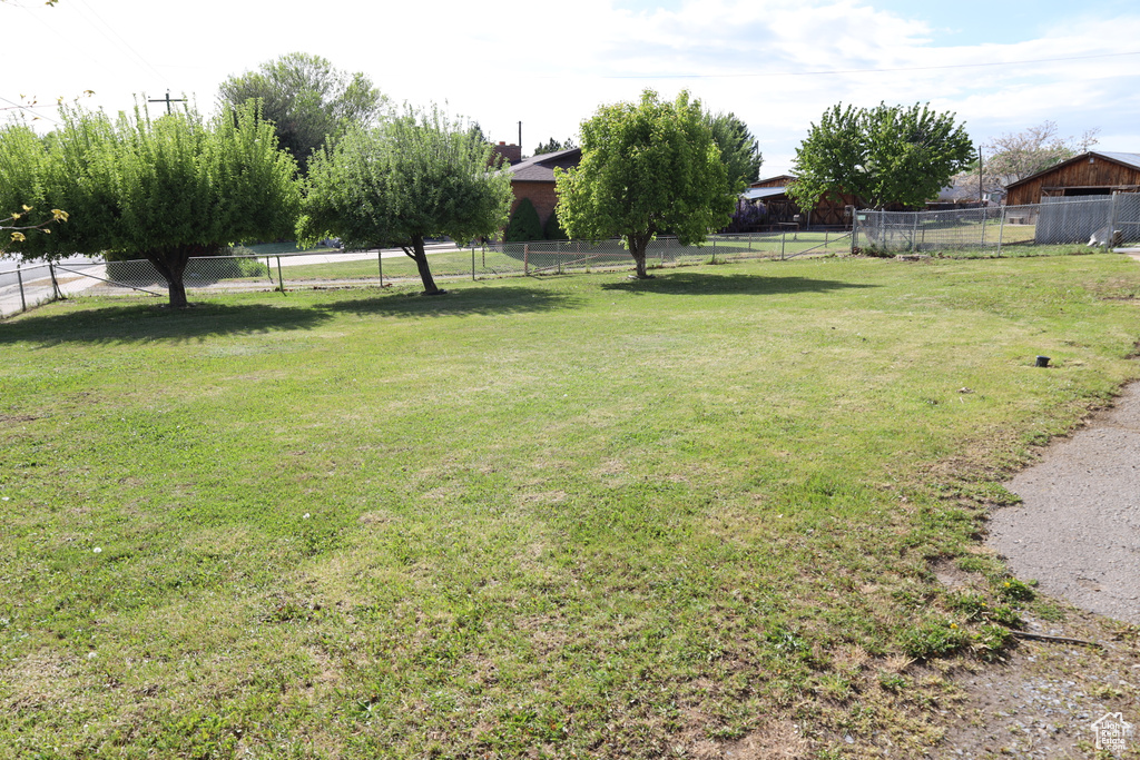 View of yard with fence
