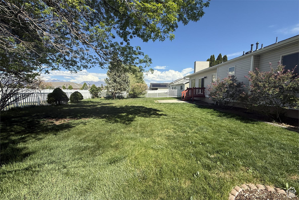 View of yard featuring a fenced backyard