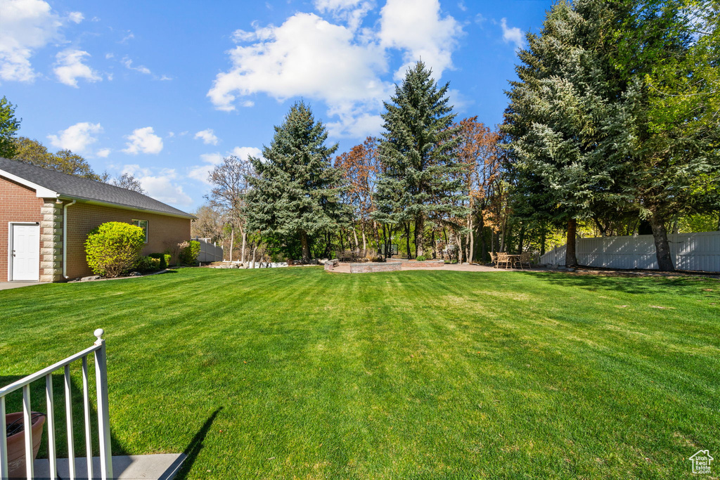 View of yard with fence