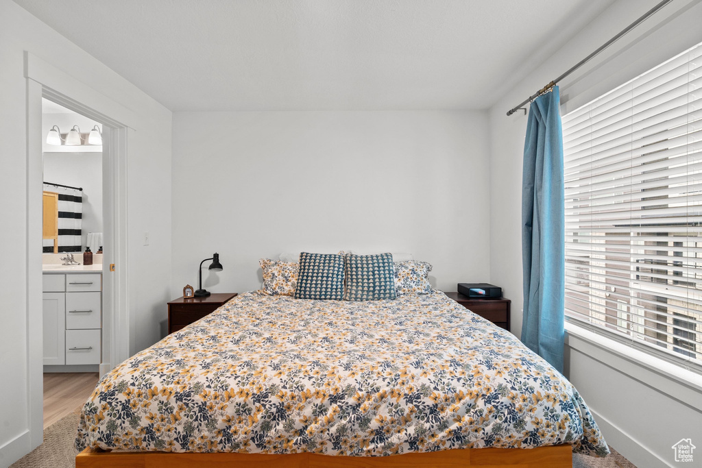 Bedroom with light wood-style flooring