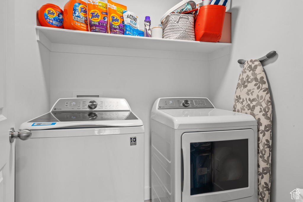 Laundry room with washing machine and dryer and laundry area