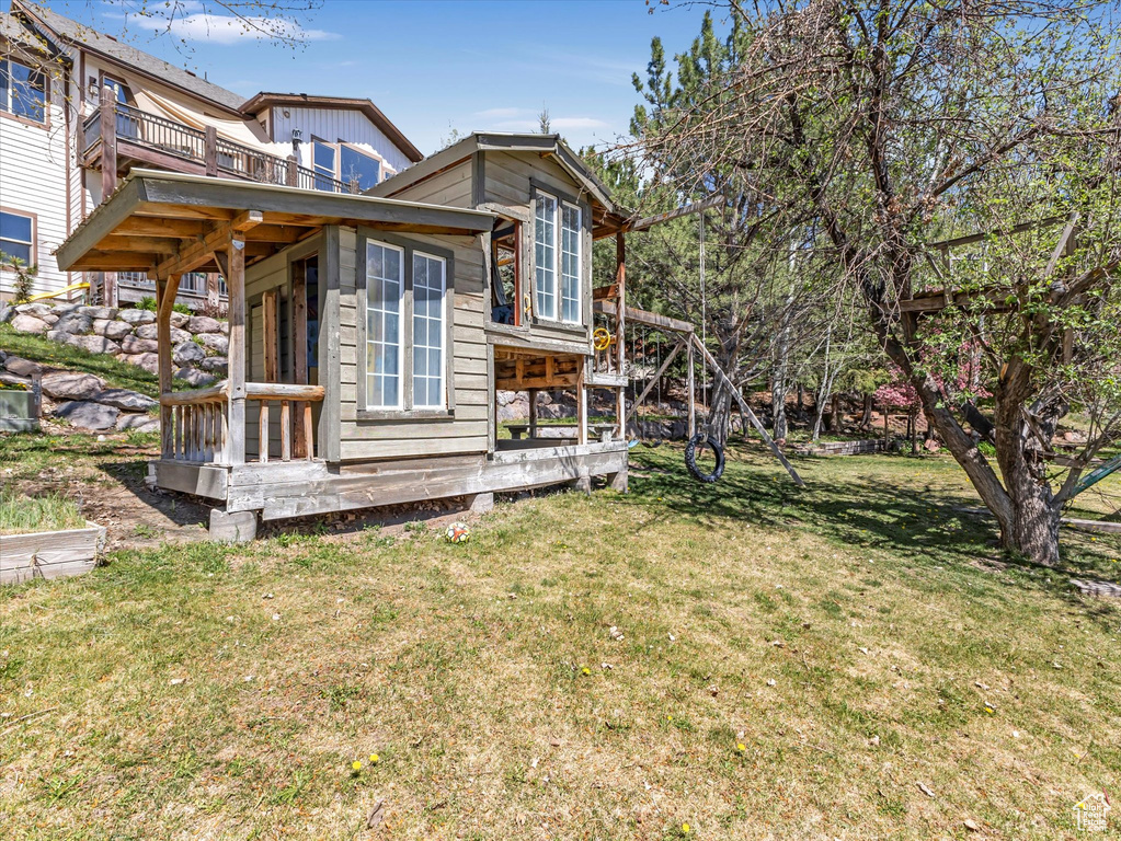 View of home's exterior with a lawn