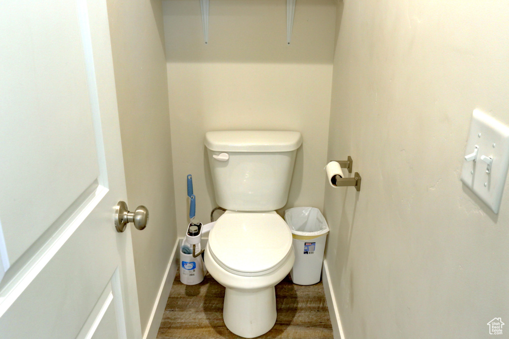 Bathroom with baseboards and toilet