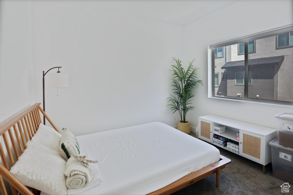 Bedroom with carpet flooring