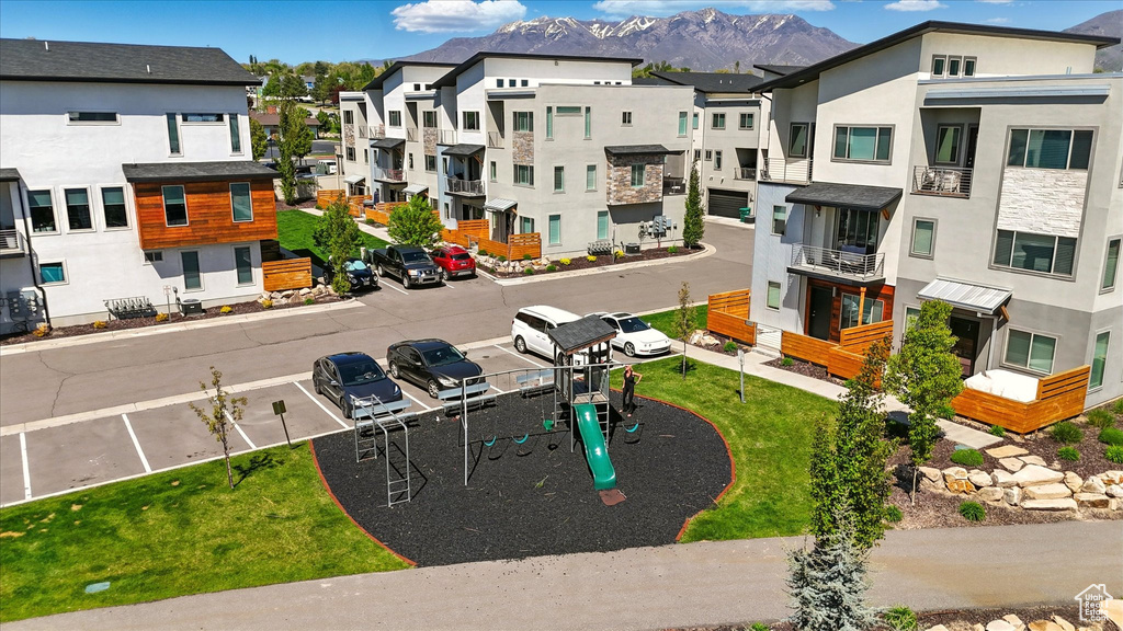 Exterior space with a residential view and a mountain view