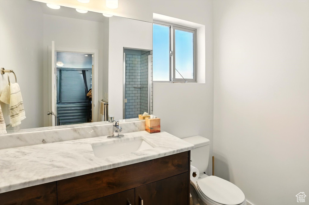 Bathroom featuring toilet and vanity