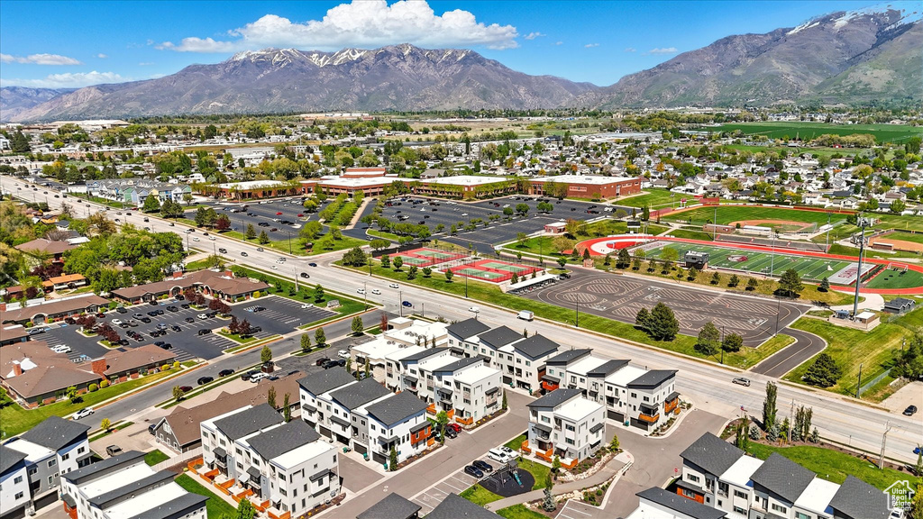 Birds eye view of property featuring a mountain view