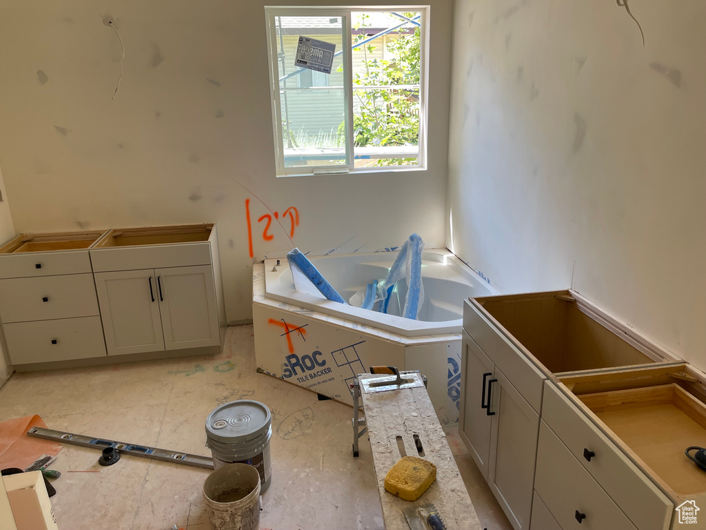 Full bath featuring a garden tub