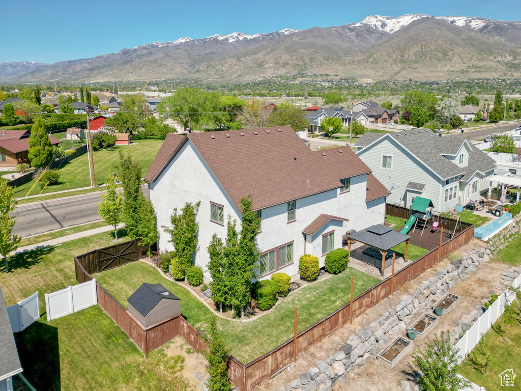 Drone / aerial view featuring a residential view and a mountain view