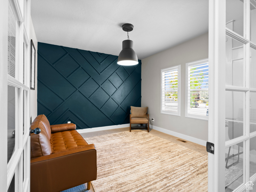 Living area featuring baseboards