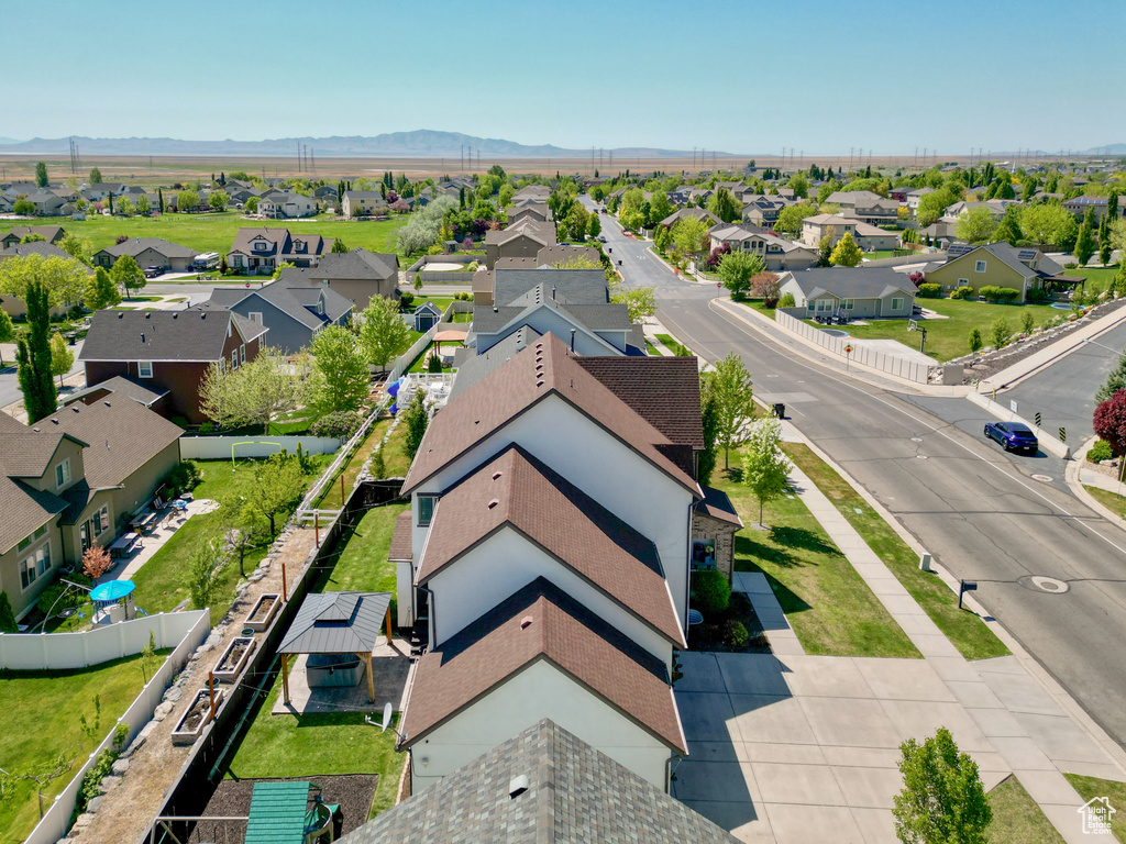 Aerial view featuring a mountain view and a residential view