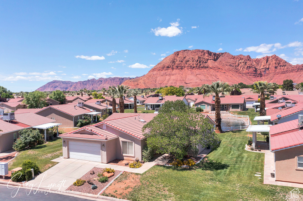 Mountain view featuring nearby suburban area