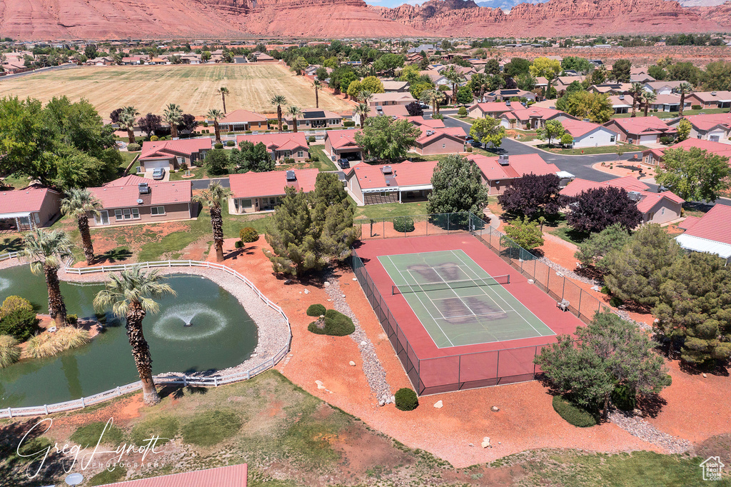 Aerial view of residential area with a water and mountain view