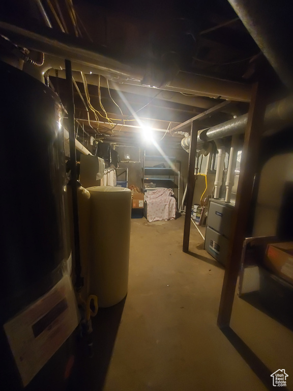 Unfinished basement with water heater