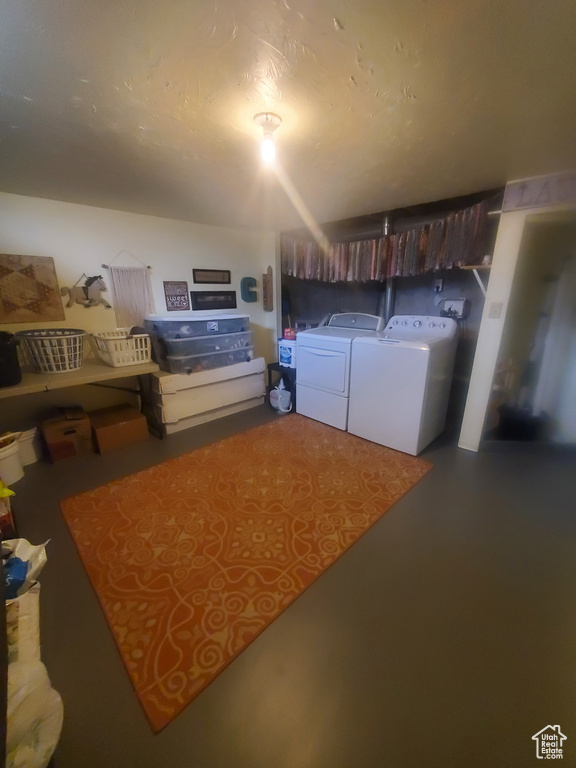 Interior space featuring independent washer and dryer