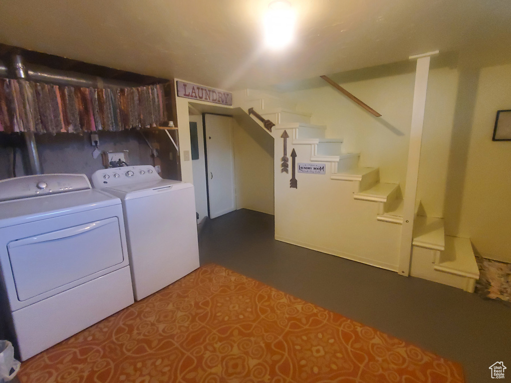 Laundry area featuring independent washer and dryer
