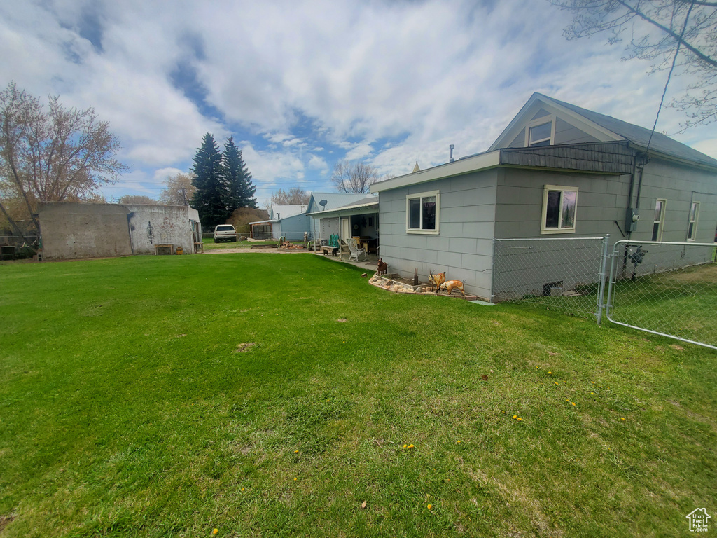 View of yard with fence
