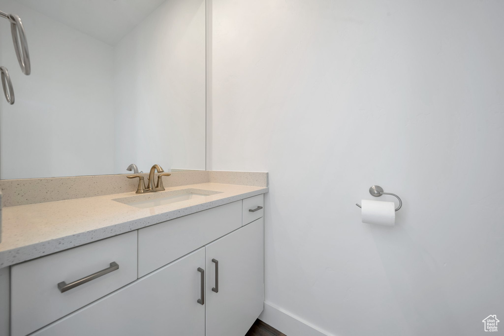 Bathroom with baseboards and vanity