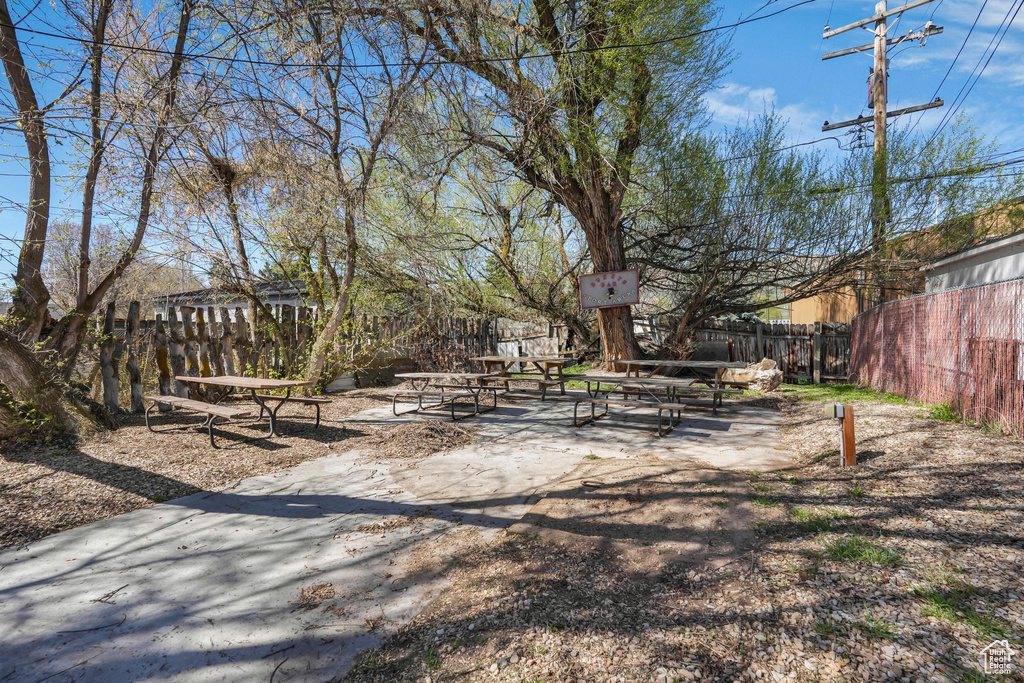 View of yard featuring fence