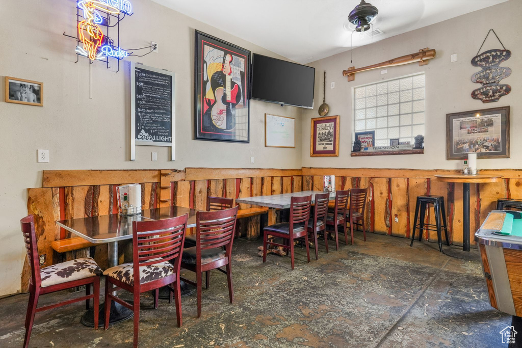 Dining space featuring a ceiling fan