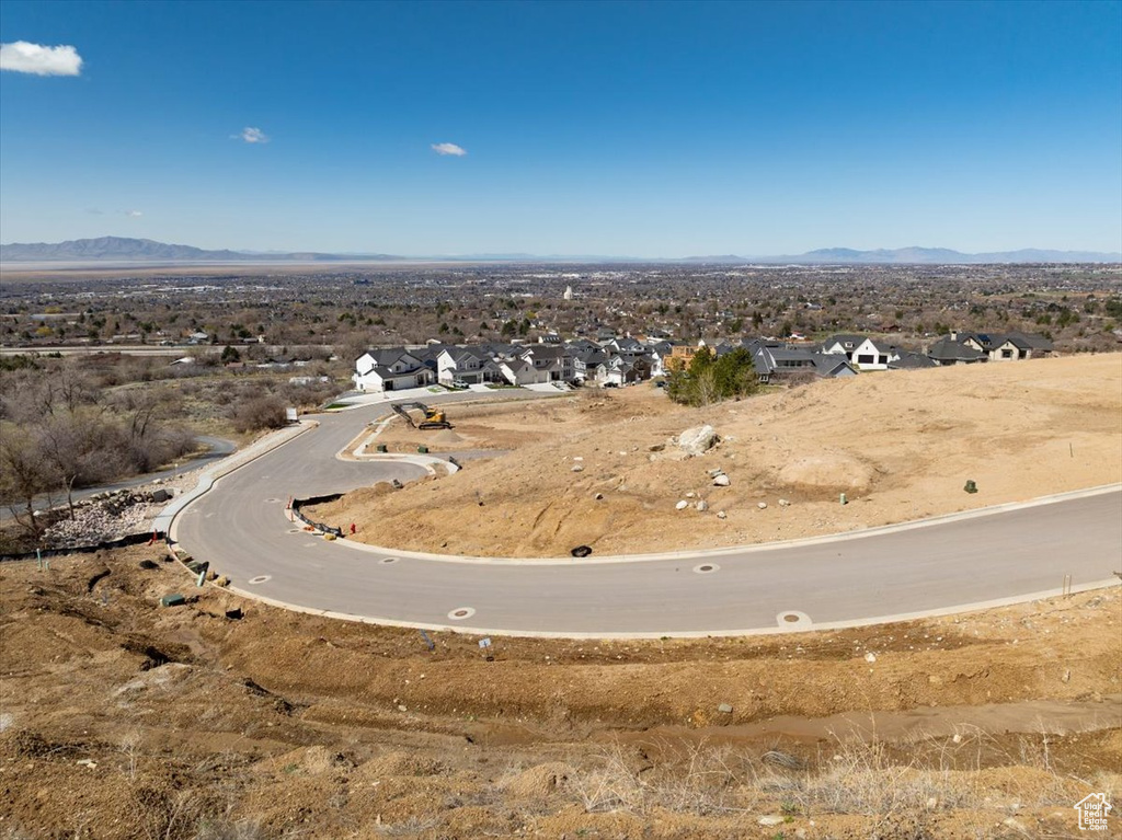 Drone / aerial view featuring a residential view and a mountain view
