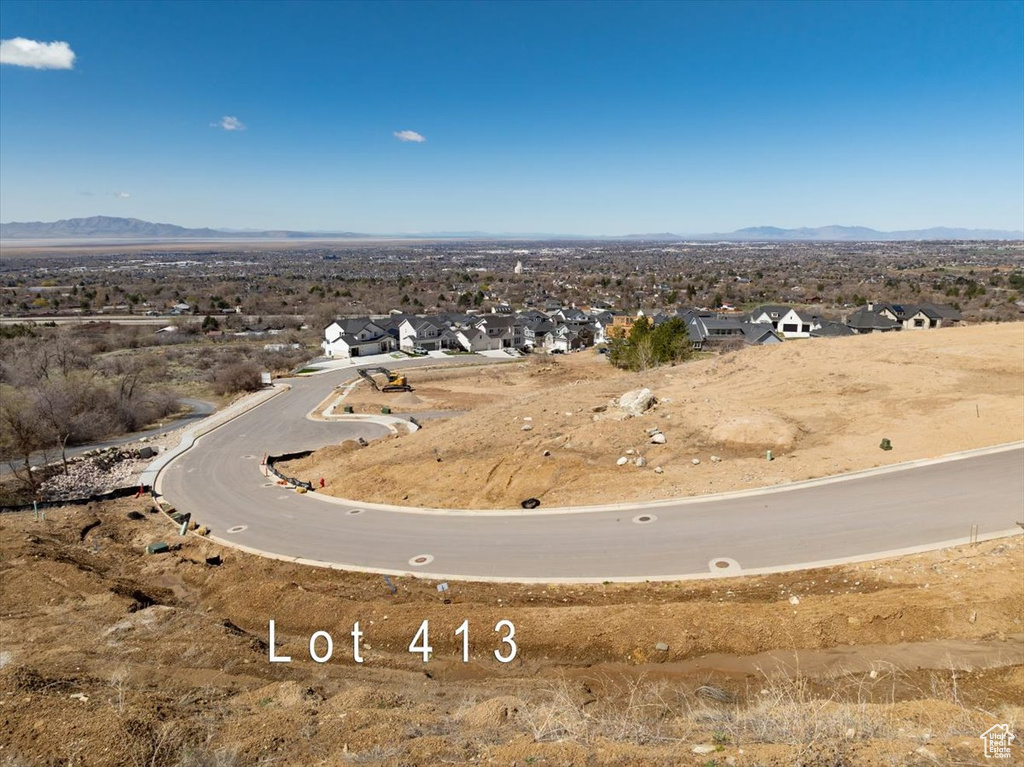 Birds eye view of property featuring a mountain view and a residential view