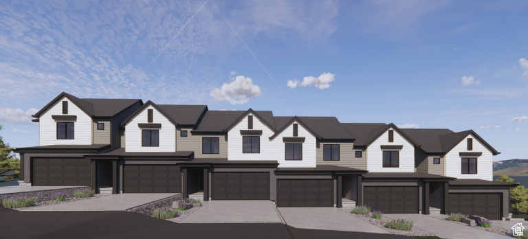 View of property featuring a garage