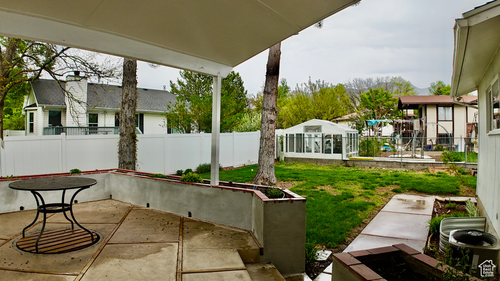 View of yard with a patio and a fenced backyard