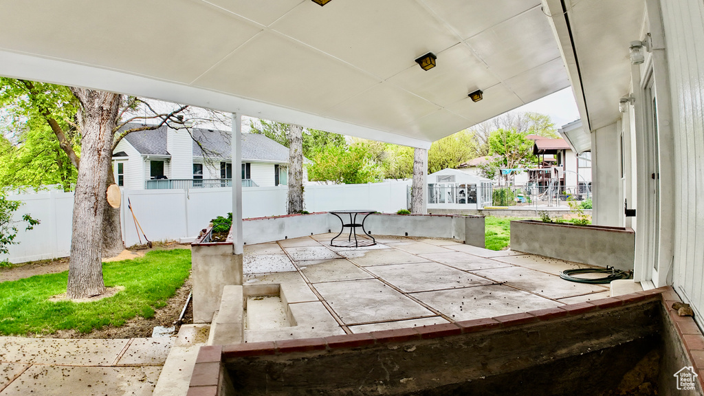 View of patio featuring a fenced backyard