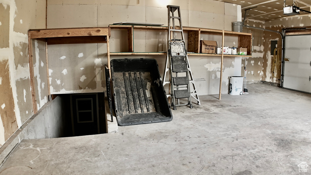 Garage featuring a garage door opener