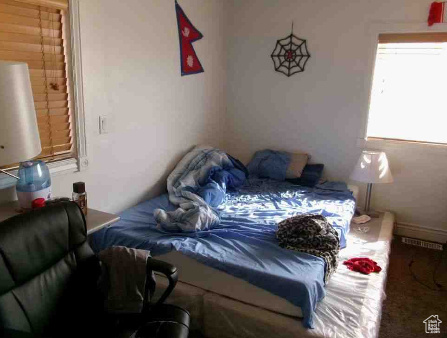 View of carpeted bedroom
