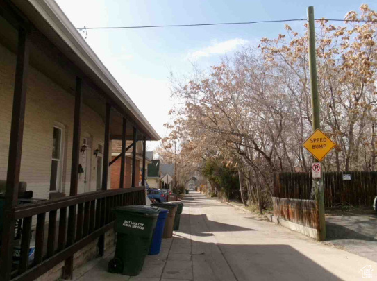 View of road featuring traffic signs