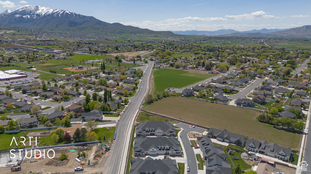 Aerial view featuring a mountain view and a residential view