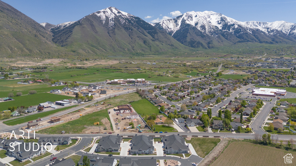 Aerial view featuring a mountain view and a residential view