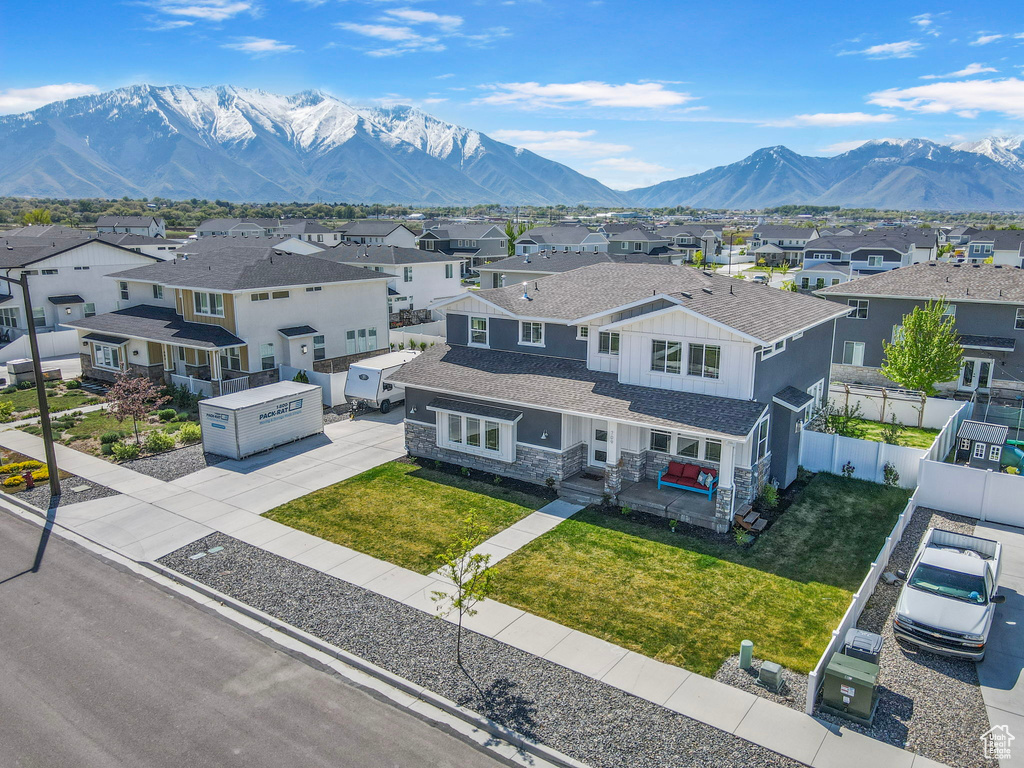 Birds eye view of property featuring a mountain view and a residential view